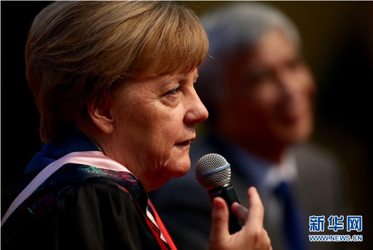 German Chancellor Angela Merkel in UCAS. (Photo by Xinhua).png